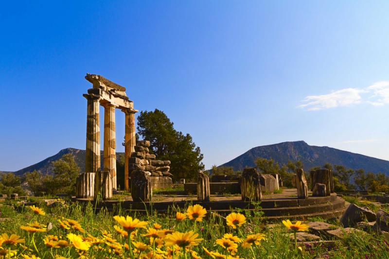 Temple Ruins with Flowers. Delphi, Greece. Credit: Shutterstock.