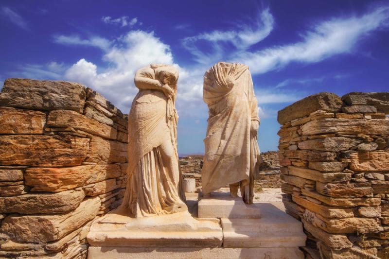 Sculptures of Cleopatra and Dioskourides in the House of Cleopatra. Delos Island, Greece. Credit: Shutterstock.