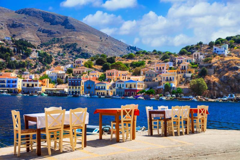 Small Street Tarvernas in Symi Island, Greece. Credit: Shutterstock