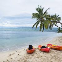 Kayaks on the beach in Fiji.