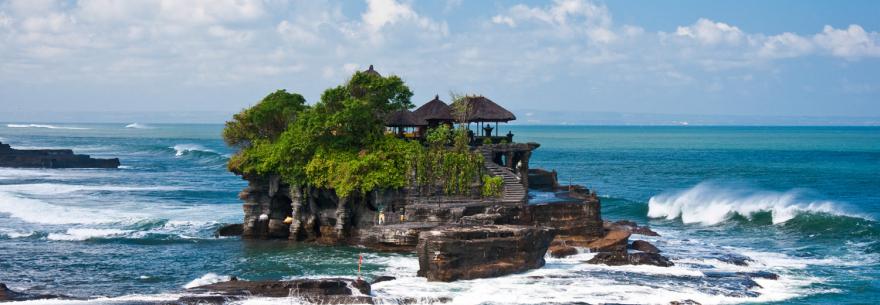 A temple located on a rocky island off the coast of Bali.